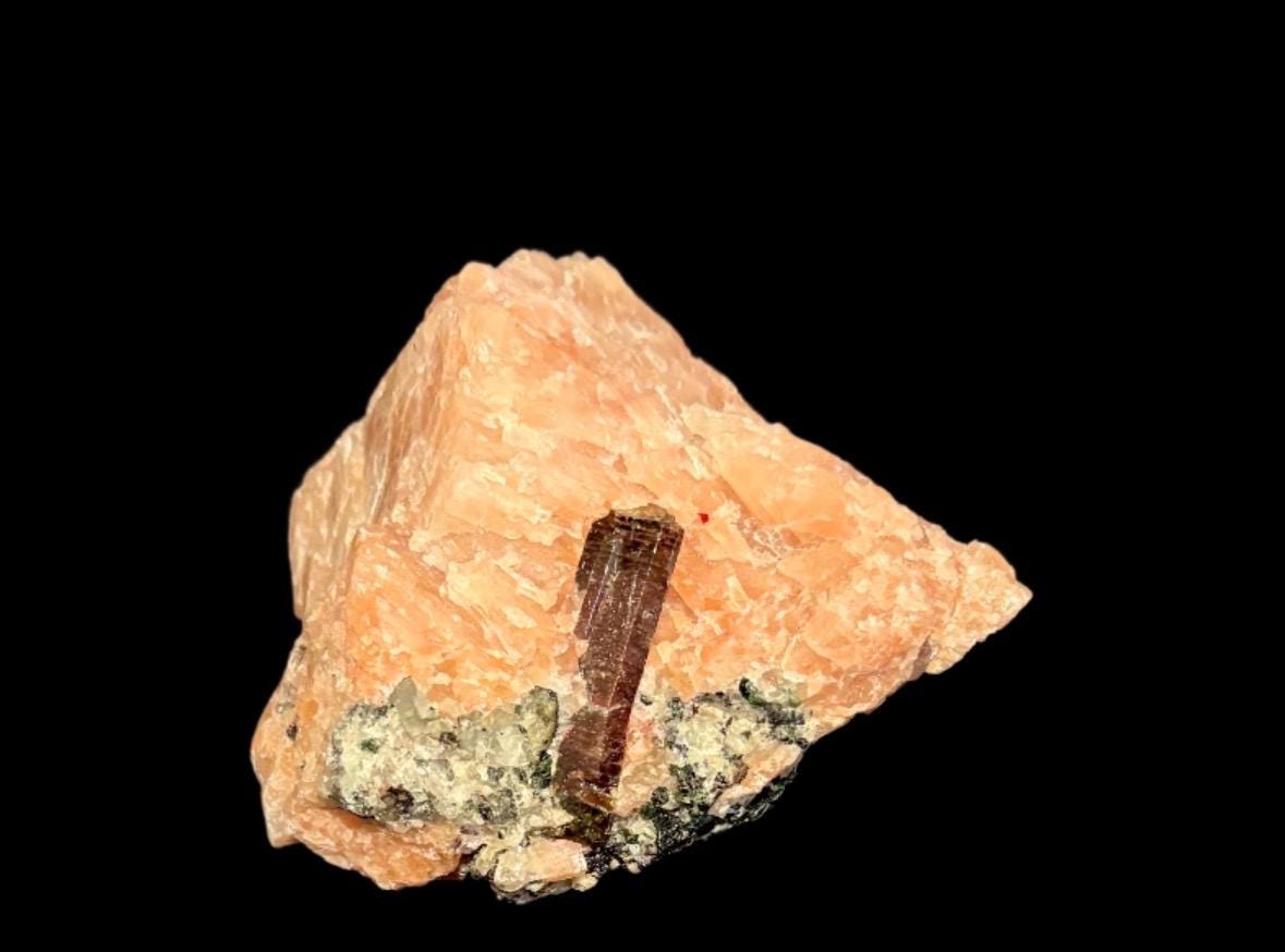 Fluorapatite on Orange-Calcite
