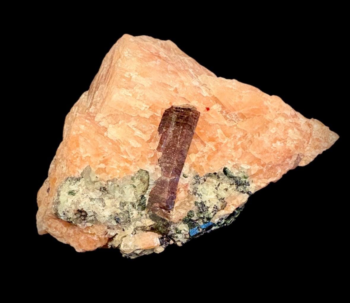 Fluorapatite on Orange-Calcite